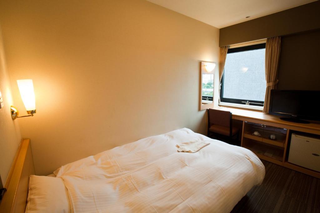 Harmonie Cinq Hotell Kitakyūshū Rum bild